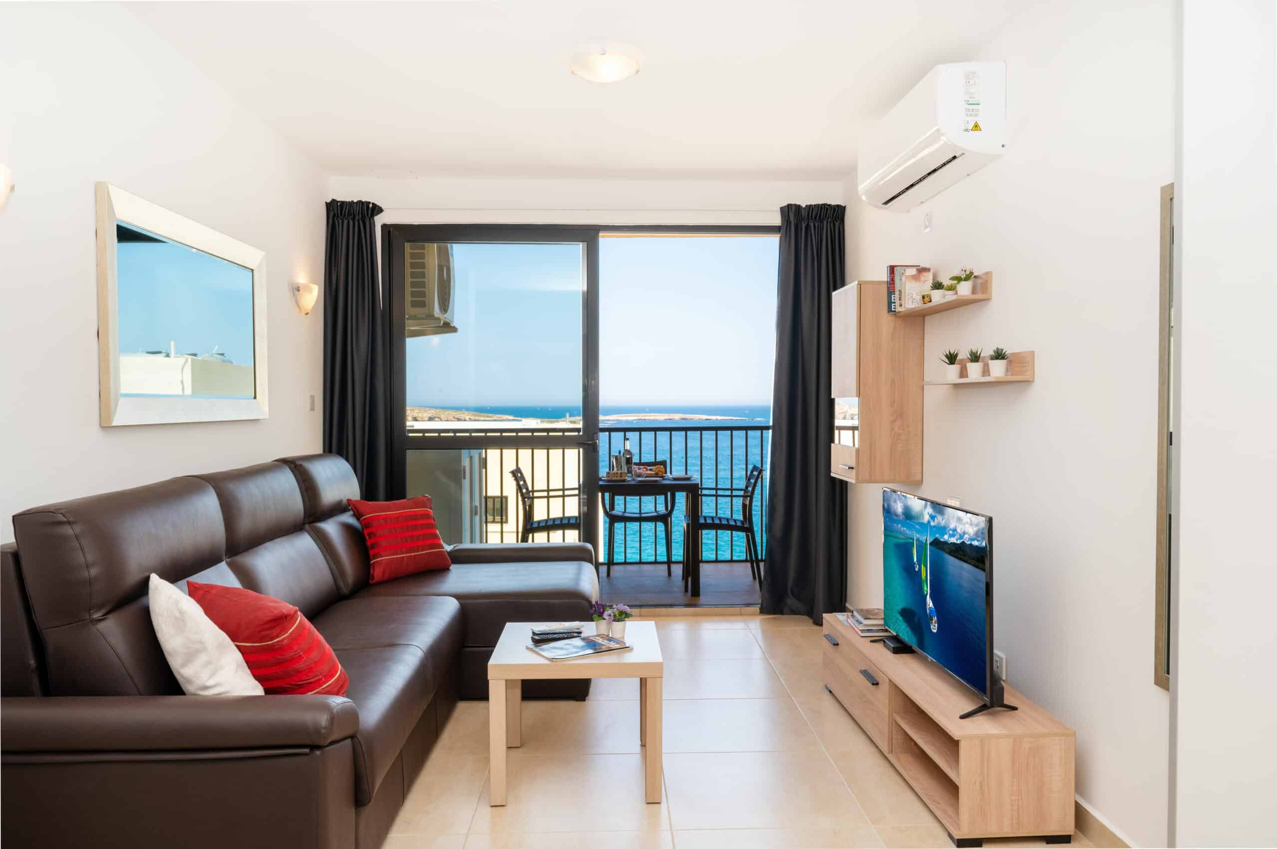 Sea Bliss 1 Bedroom Penthouse with Two Terraces and Side Sea Views – Bugibba