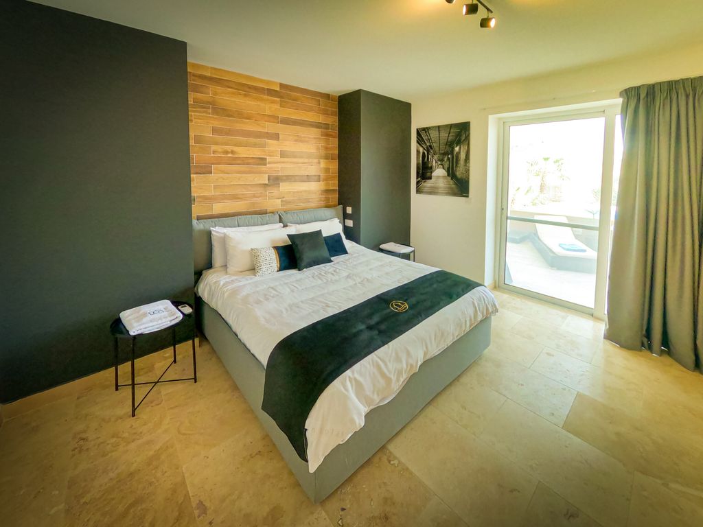 Hygge - 4-Bed Luxury Apartment | Hot Tub | Mini Gym | Steps from Ramla Bay | Xaghra, Gozo