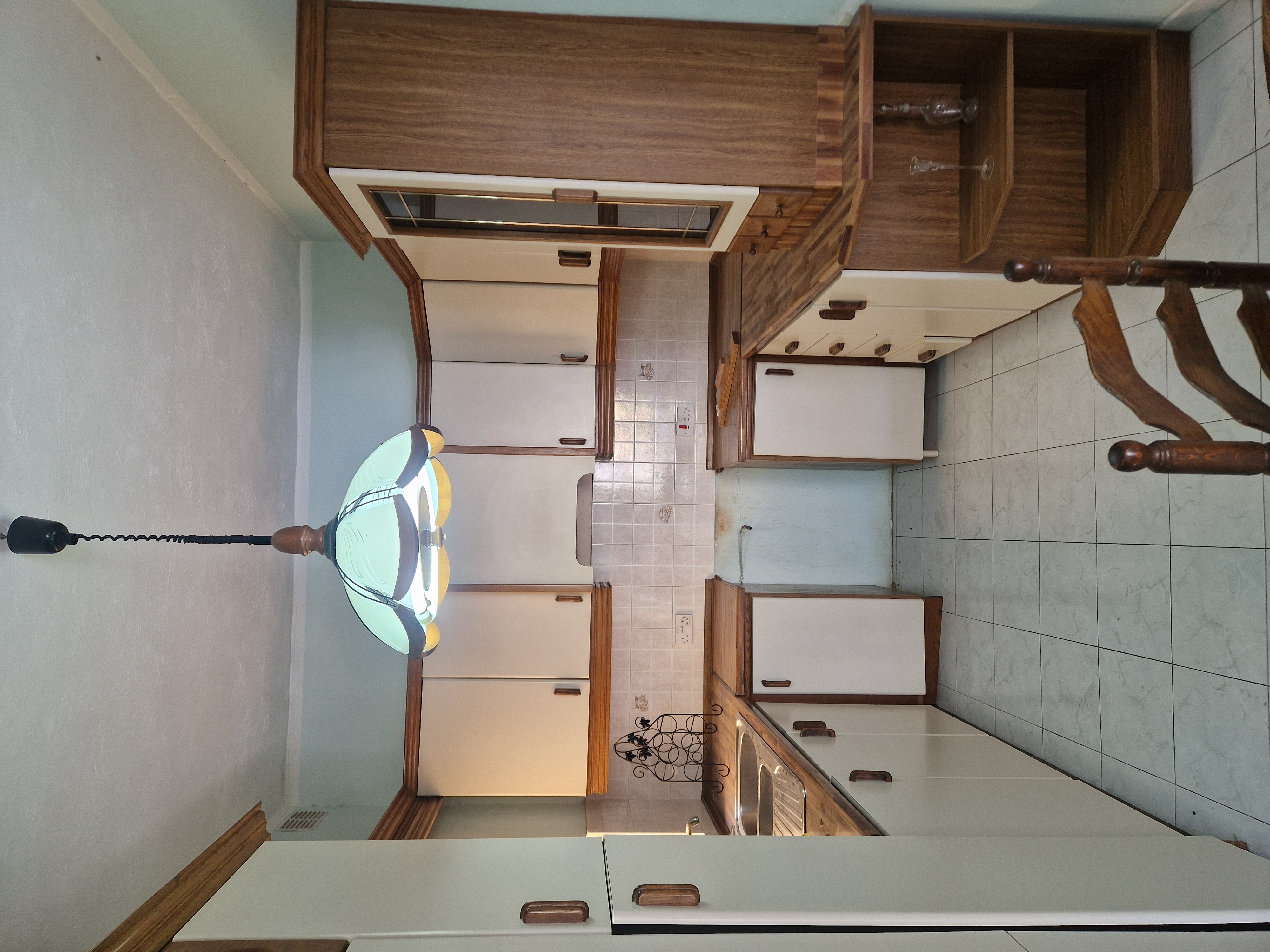 Kitchen Setup with Appliances and Furniture for sale