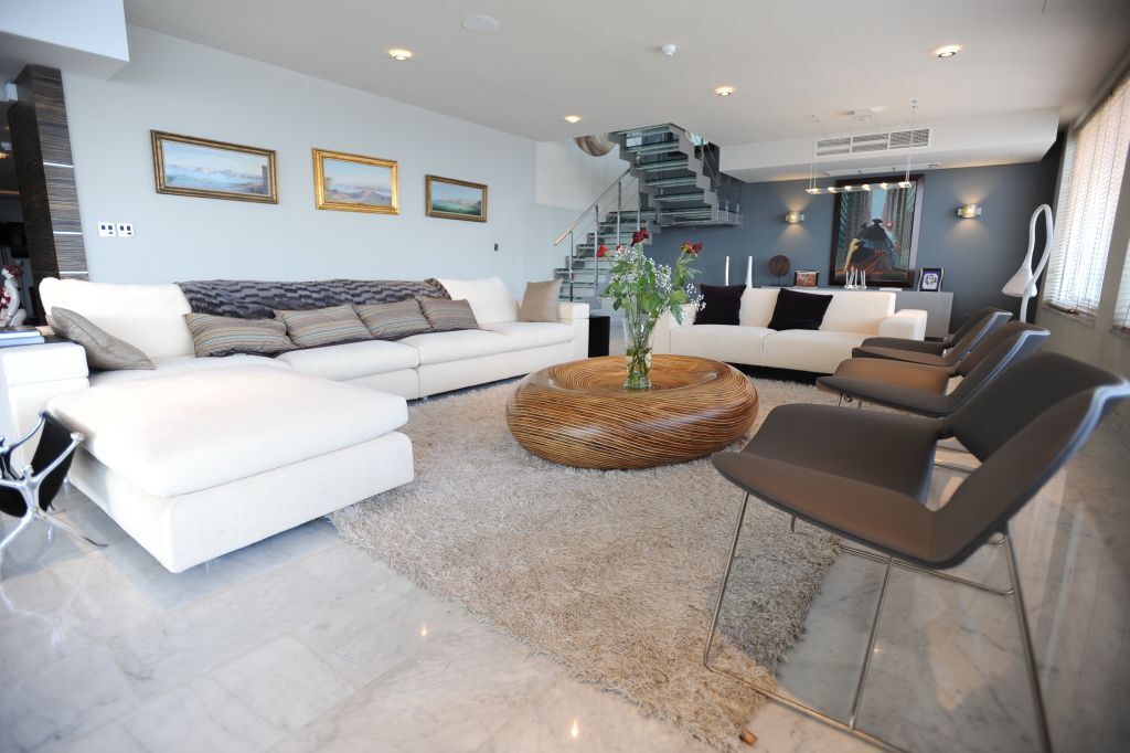 Exceptional Designer-Finished Direct Seafront Duplex Penthouse in Sliema
